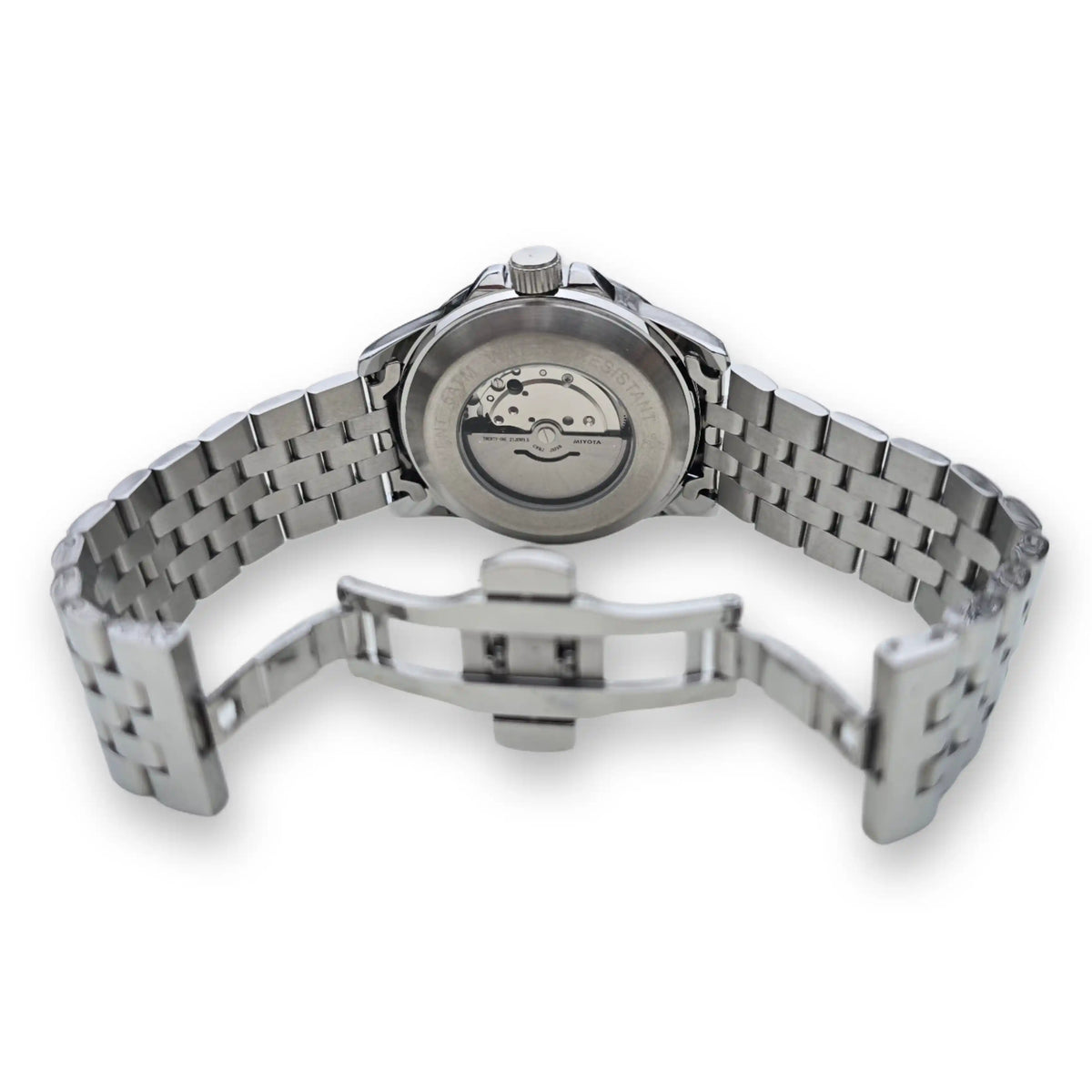 Back of the silver MVL AK47 watch with visible automatic movement and folding clasp