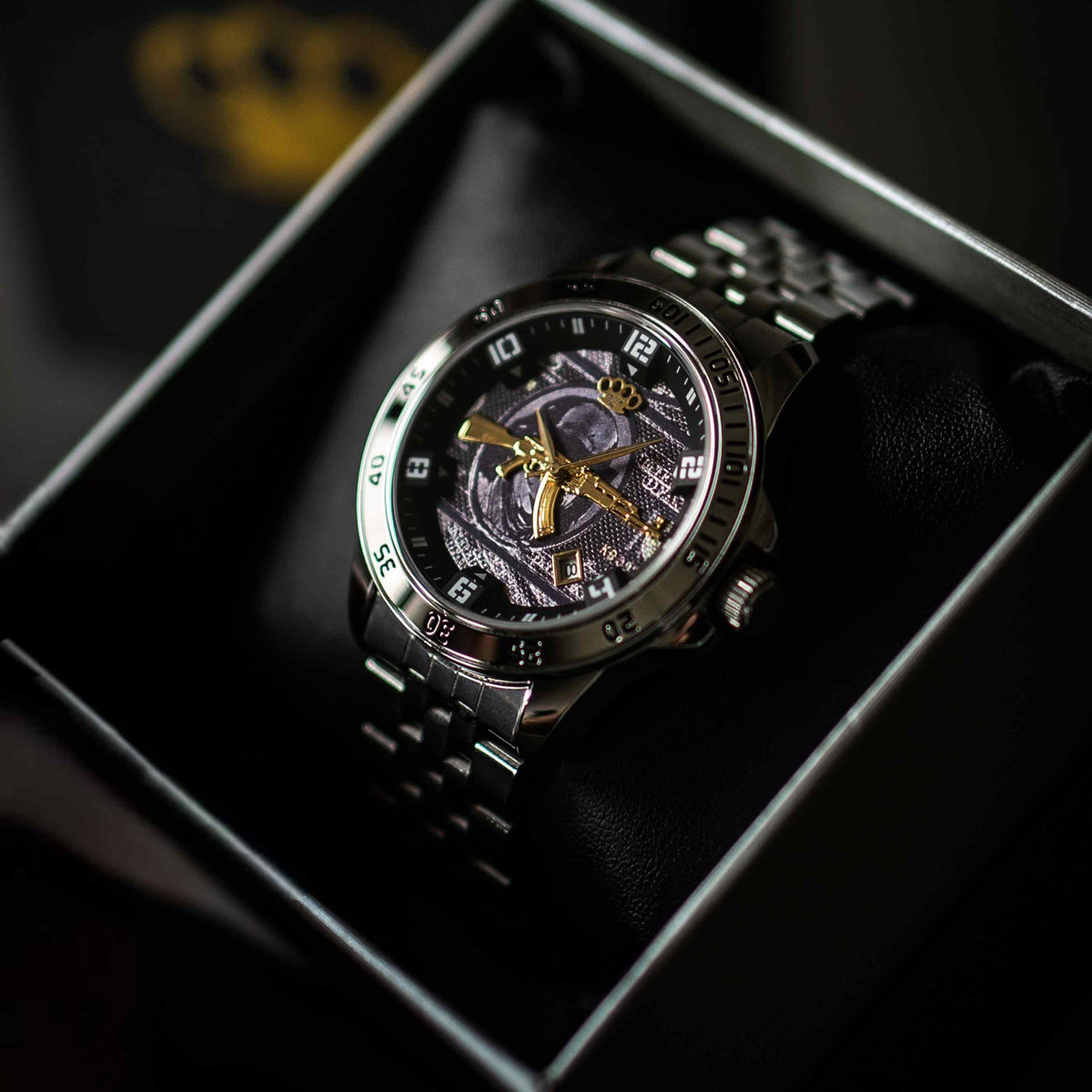 Mi Vida Loca AK47 automatic watch in silver with gold AK47 on the dial, in the watch box